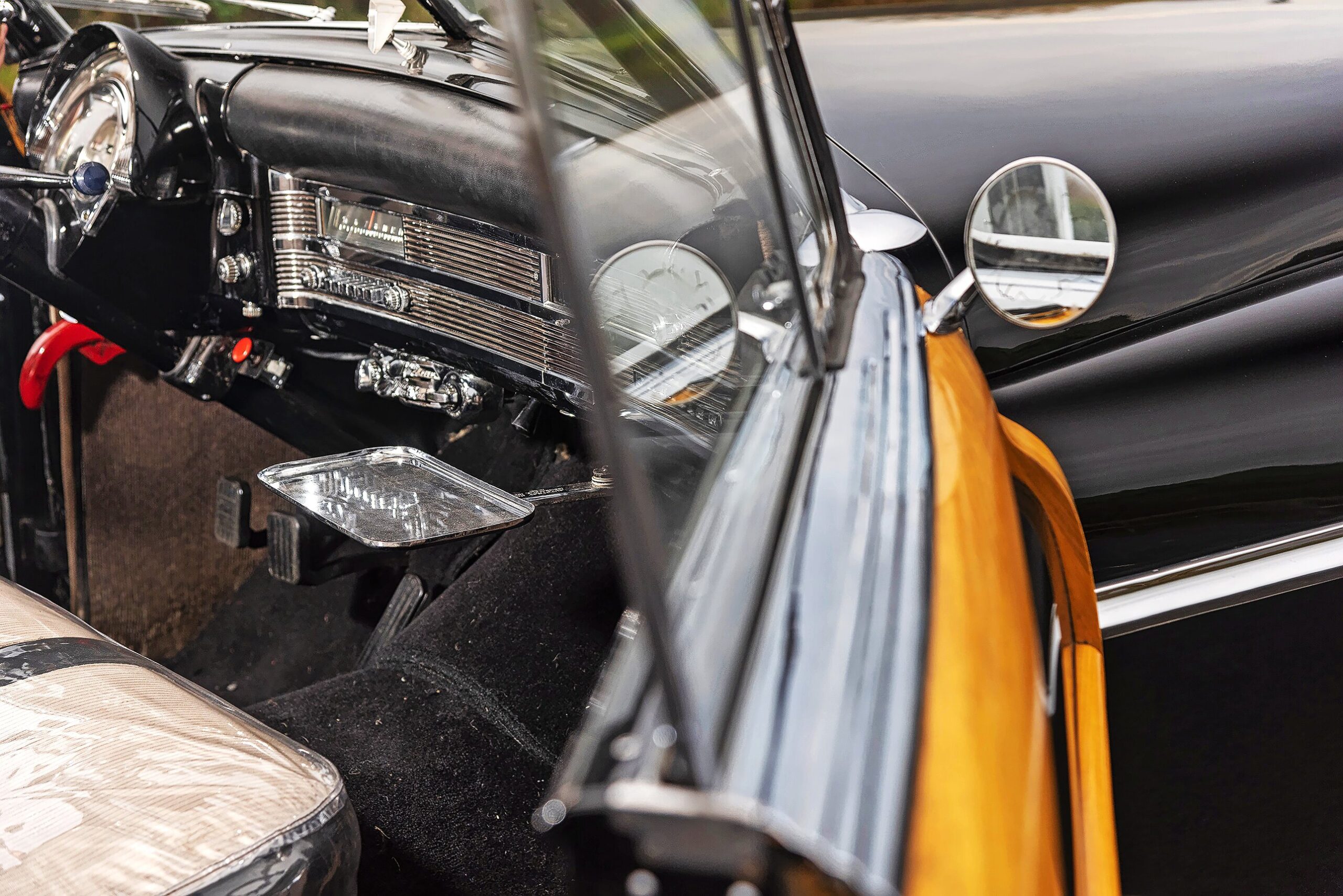 Inside the Chrysler Town & Country Newport Coupe with a fold-out tray