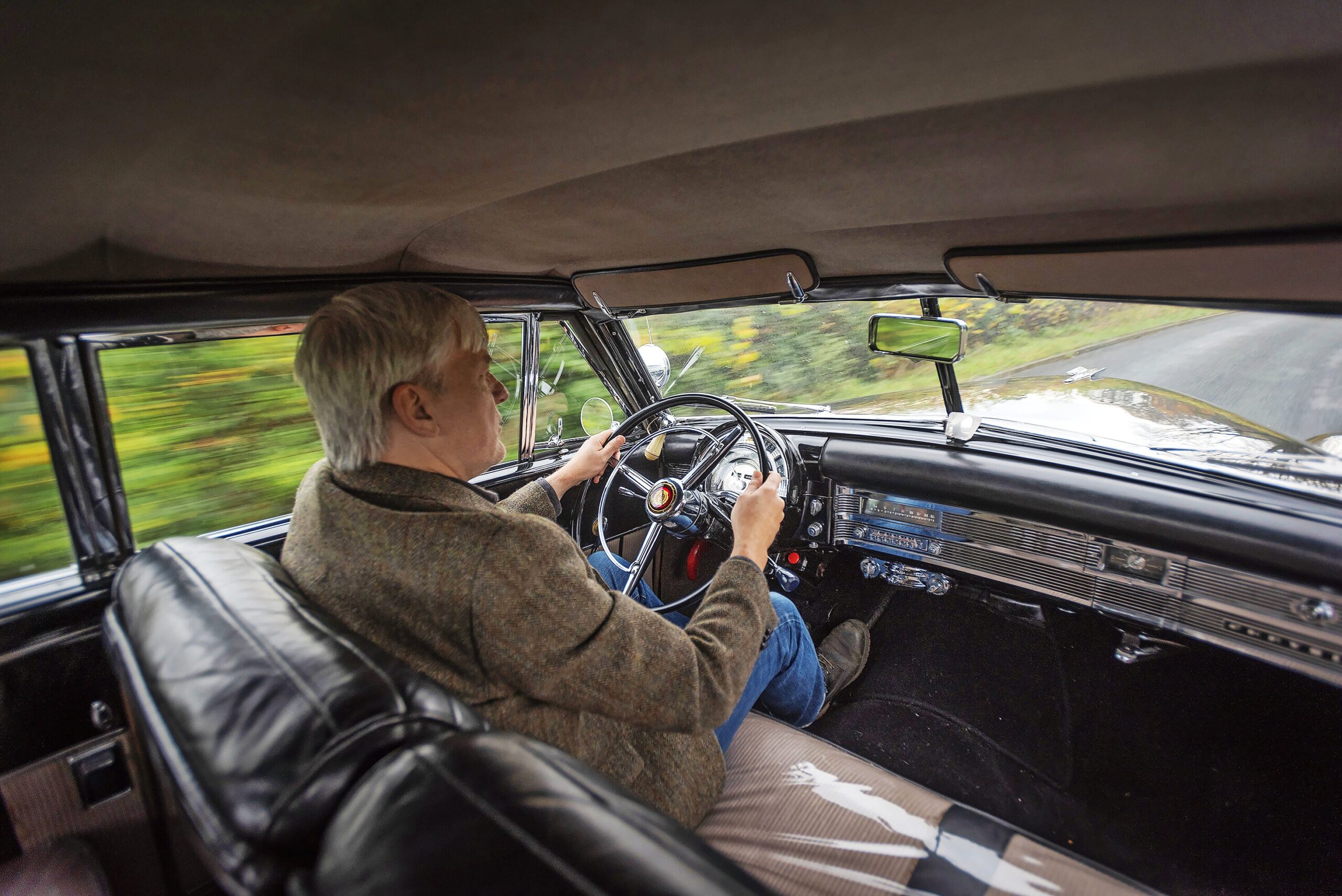 Driver in the Chrysler Town & Country Newport Coupe
