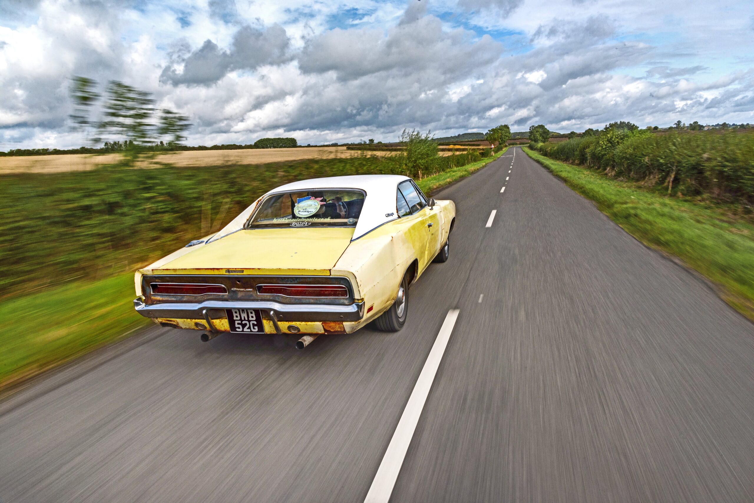 Dodge Charger being driven, seen from the back