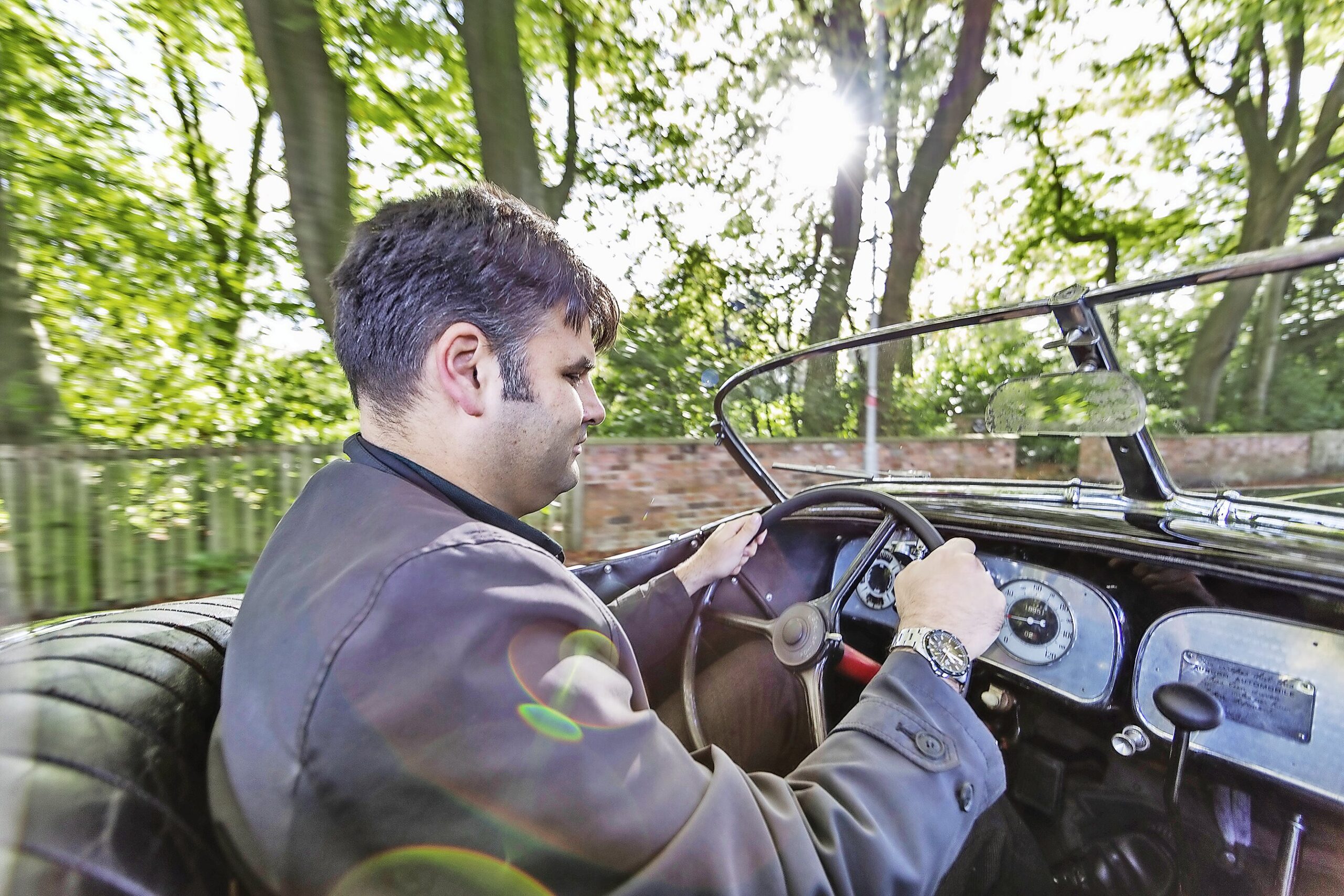 Driver in the Auburn 851 Speedster cockpit