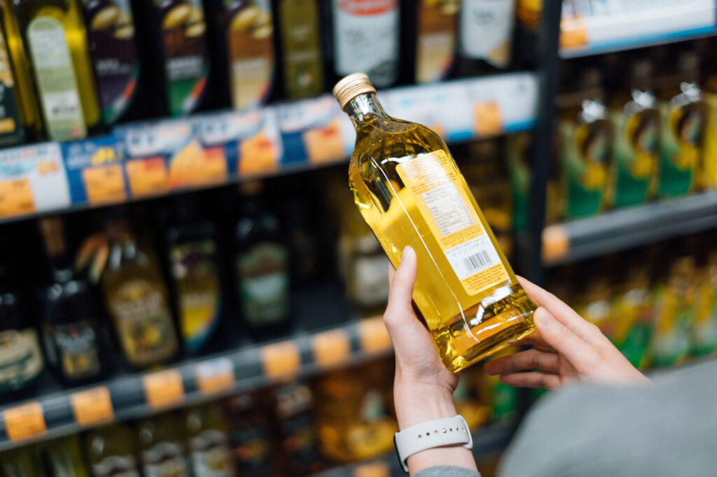 A bottle of vegetable oil in a supermarket