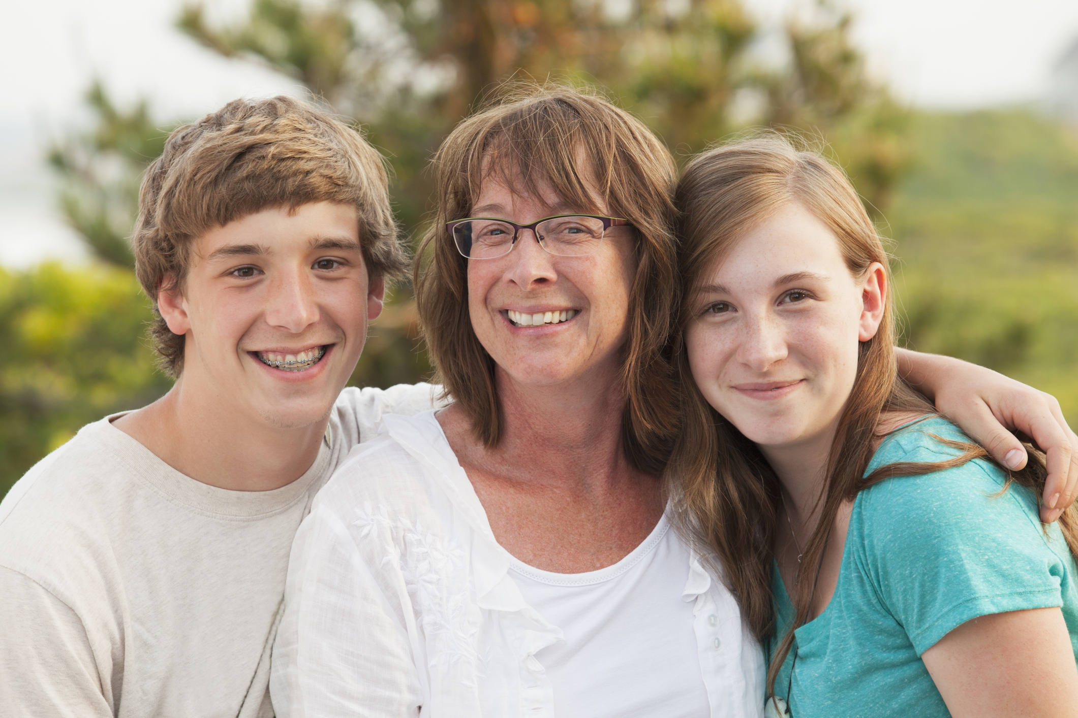 Portrait of a woman smiling with her children