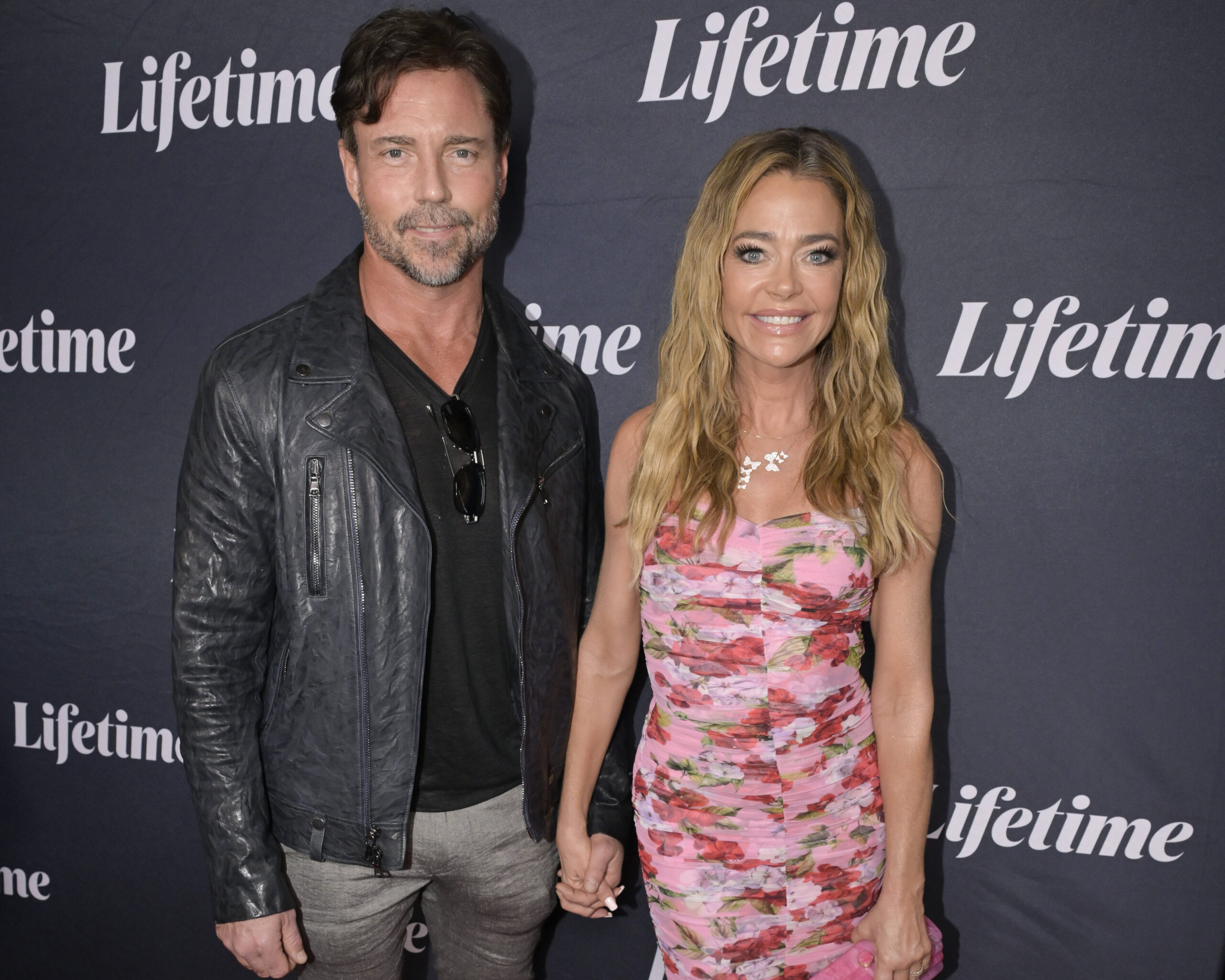 August 8, 2024, Westwood, California, USA: Aaron Phypers and Denise Richards attend Lifetimeââ¬â ¢s Los Premiere of Te Pamela Anderson in Baywatch