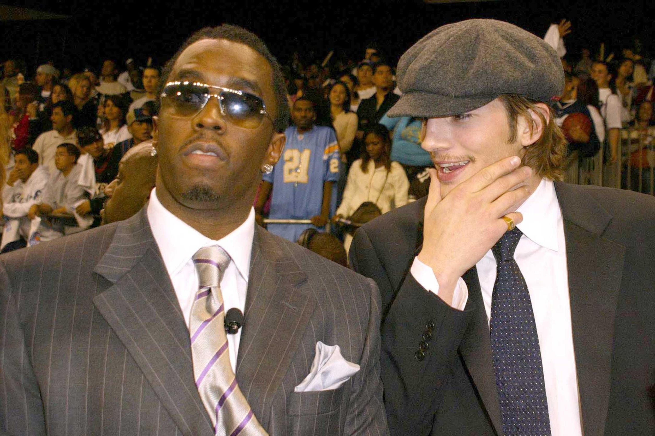 Sean 'P Diddy' Combs and Ashton Kutcher at the 2004 NBA All-Star Celebrity Basketball Game in the Lo