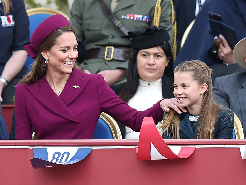 The Royal Family Watch Military Procession To Mark The 80th Anniversary Of VE Day Kate and Charlotte
