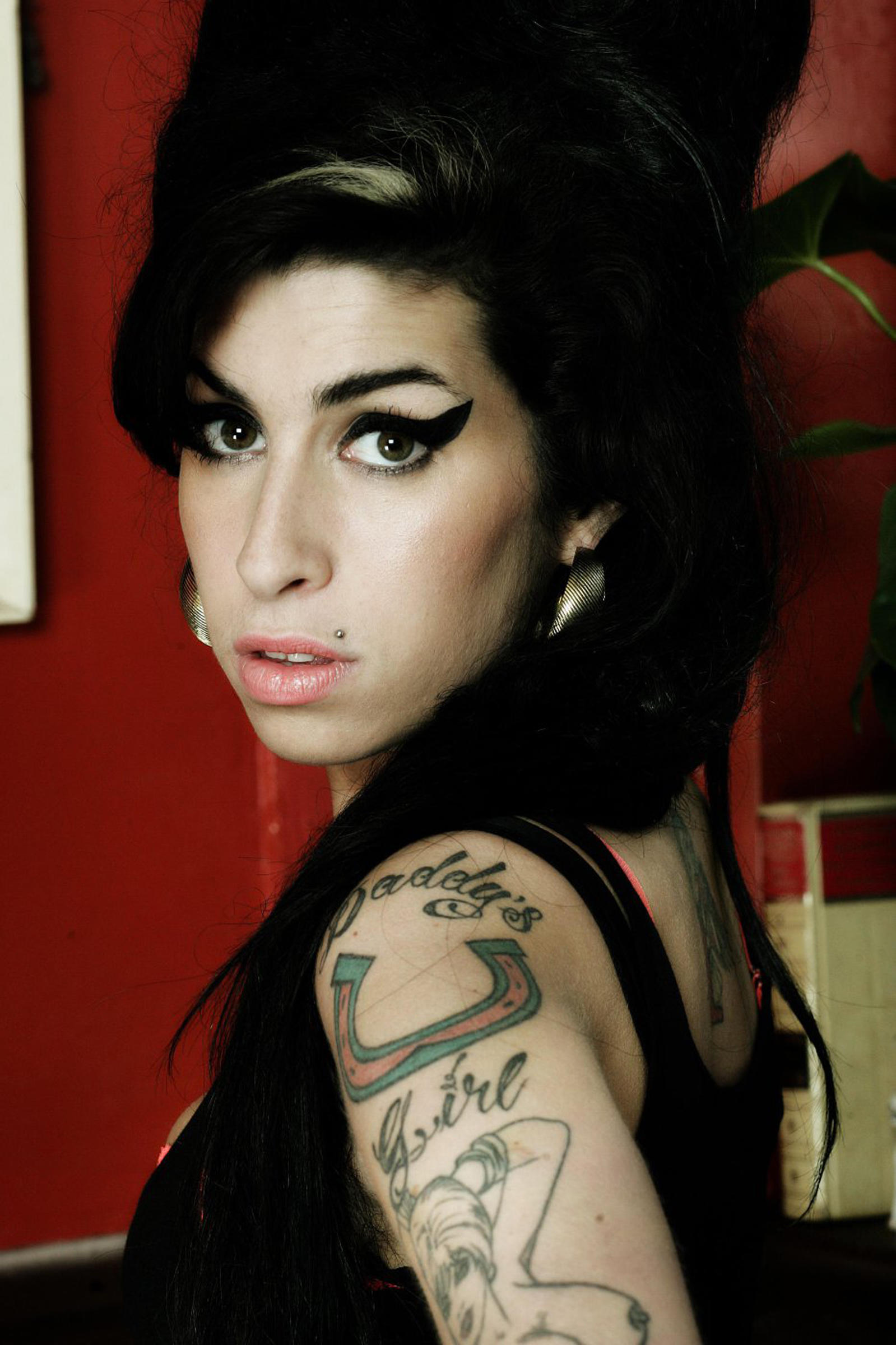 Amy (also known as Amy: The Girl Behind The Name) is a 2015 British documentary film that depicts the life and death of British singer and songwriter Amy Winehouse, directed by Asif Kapadia.This photograph is for editorial use only and is the copyright