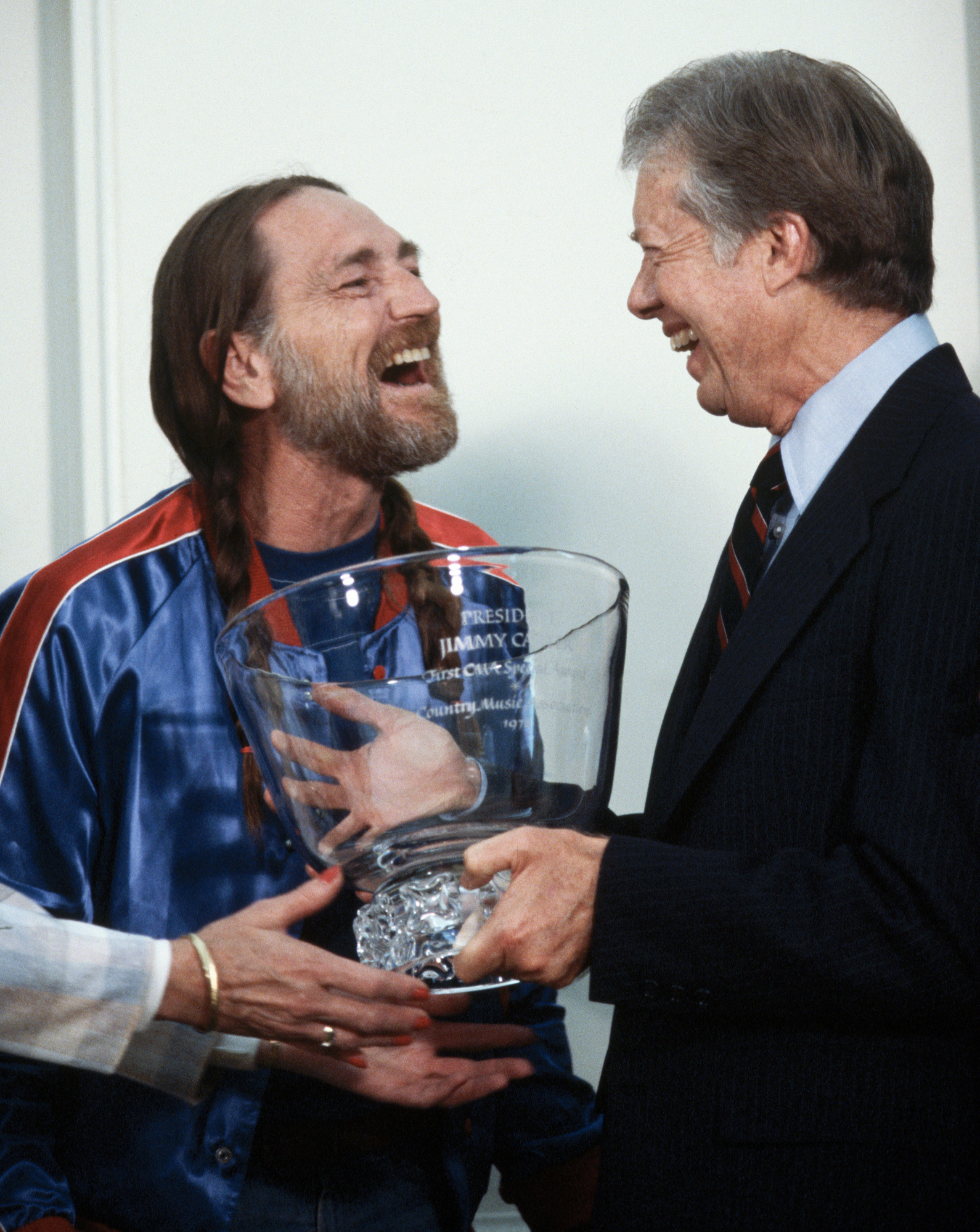Willie Nelson Presenting Award to Jimmy Carter