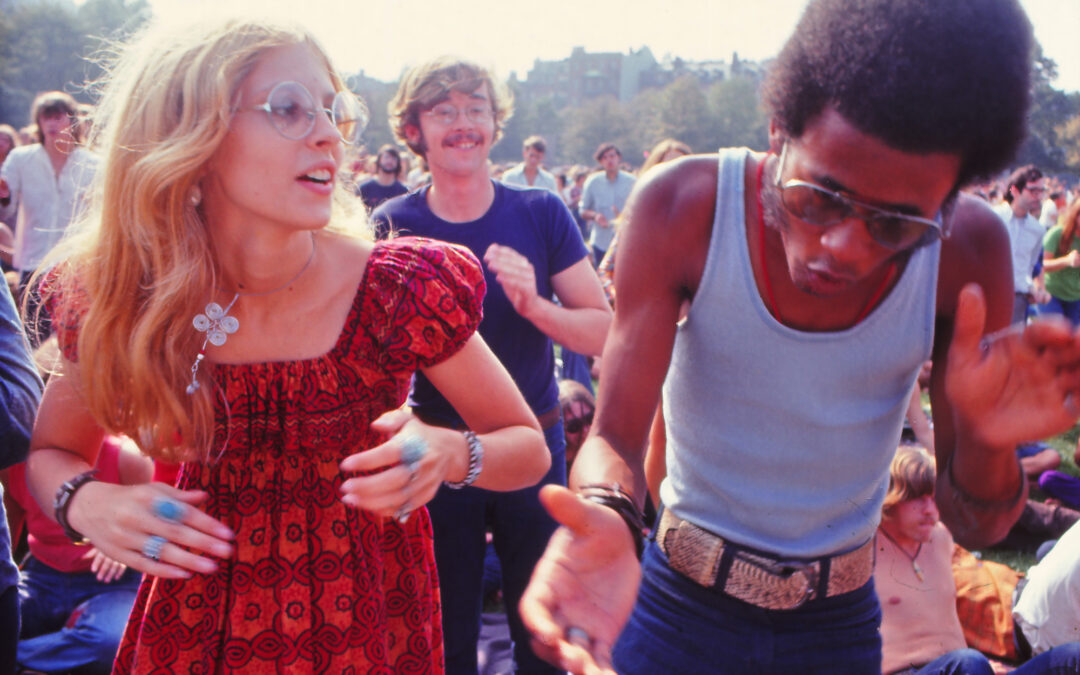 Couple dancing in a public park, 1969