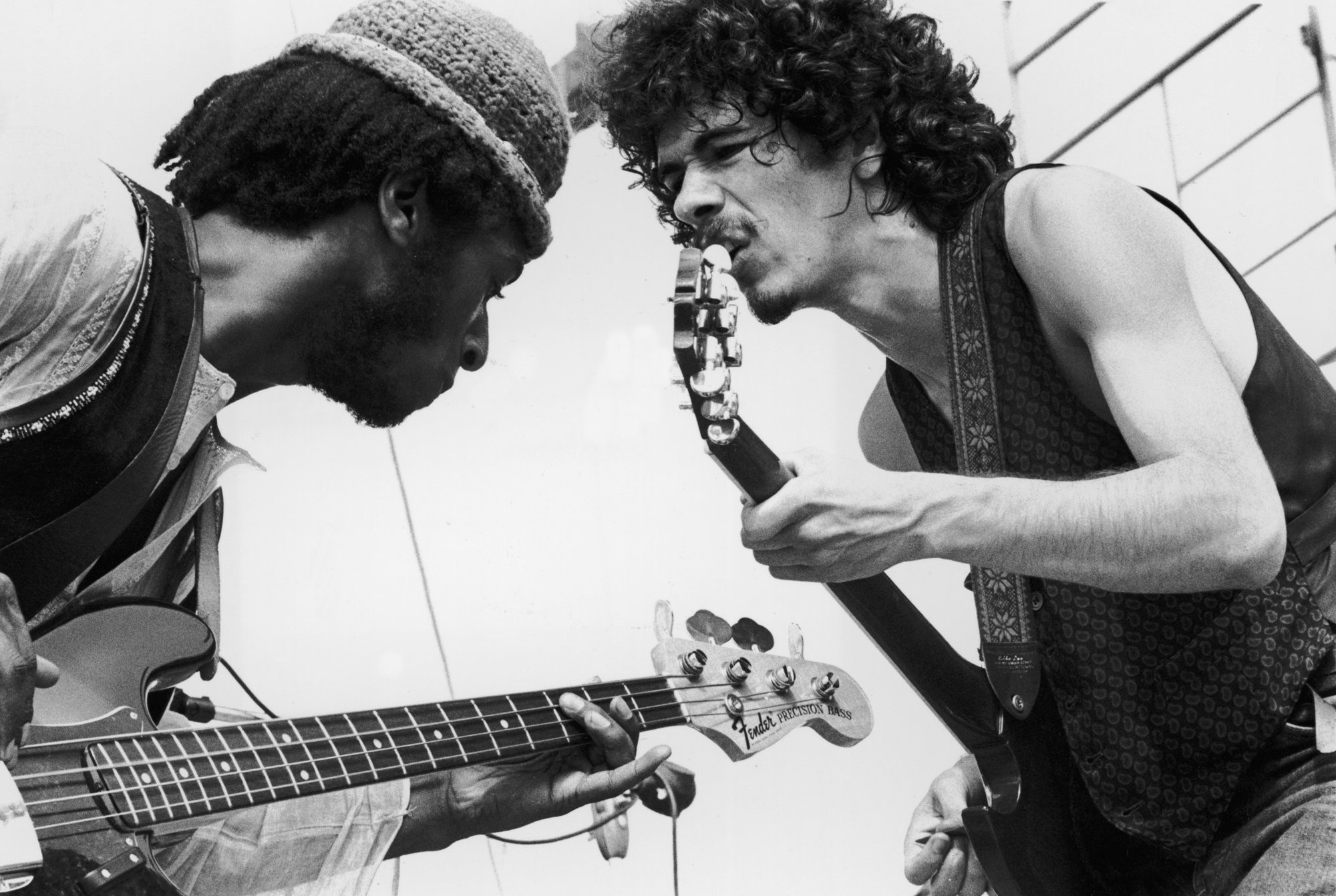 Dueling Guitars Carlos Santana (right) and bassist David Brown perform with the group Santana at the Woodstock Music Festival