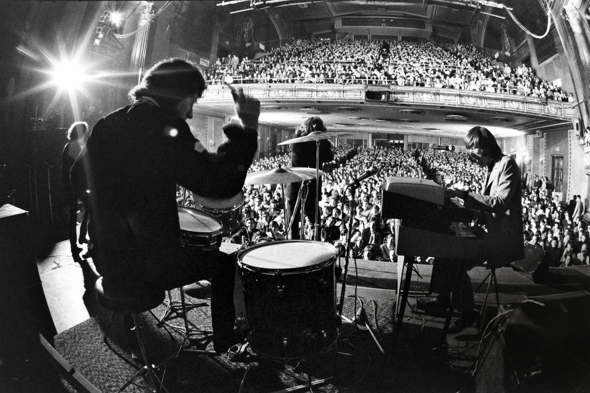 The Doors: Drummer John Densmore, singer Jim Morrison and keyboardist Ray Manzarek, playing at the Fillmore East.