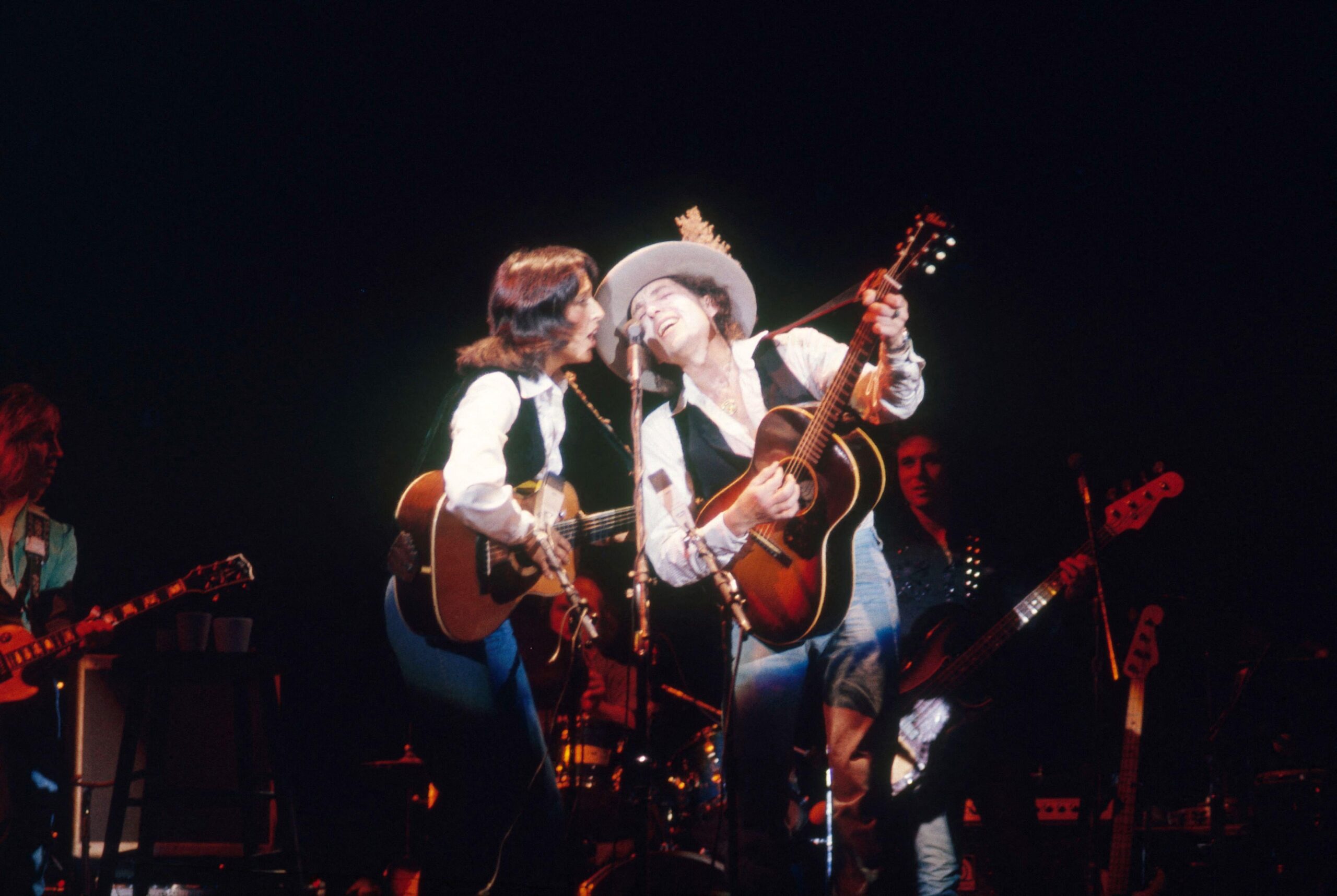 Bob Dylan and Joan Baez in concert during the Rolling Thunder Revue, at the Civic Center, Springfield, MA.