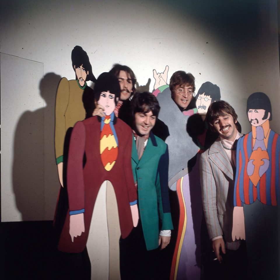 The Beatles posed with cardboard cutouts of their 'Yellow Submarine' characters at TVC animation Studios in London, 6th November 1967